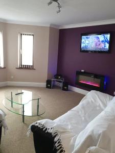 Et tv og/eller underholdning på Minehead Seaview Apartments + 11 billeder