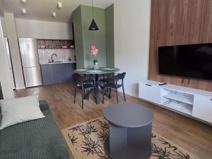 Kuchyň nebo kuchyňský kout v ubytování Urban Jungle Apartament Bill
