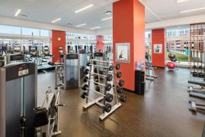 a gym with treadmills and weights in a building at JW Marriott Indianapolis in Indianapolis