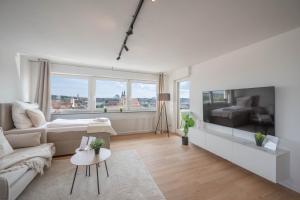 Χώρος καθιστικού στο Malu Rooms - Über den Dächern der Stadt, Zentrum, Panorama, Terrasse, höchste FeWo der Stadt +13 φωτογραφίες