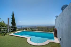Swimmingpoolen hos eller tæt på Villa Bandama Golf