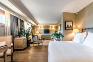 Postel nebo postele na pokoji v ubytování Grand Hotel Don Gregorio