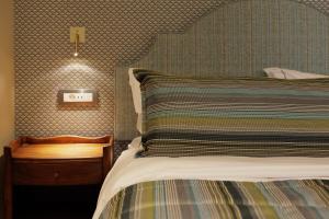 Letto o letti in una camera di Albergo Botti