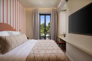 Letto o letti in una camera di Albergo Botti