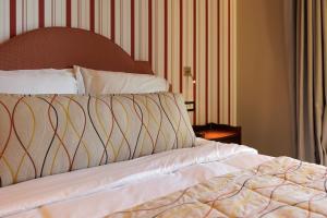 Letto o letti in una camera di Albergo Botti