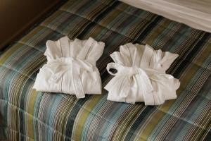 Letto o letti in una camera di Albergo Botti