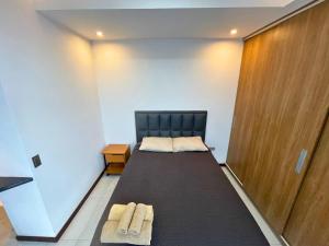 Postel nebo postele na pokoji v ubytování MONOAMBIENTES RESIDENCIALES en TARIJA