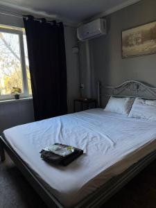 Ένα ή περισσότερα κρεβάτια σε δωμάτιο στο House