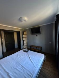 Ένα ή περισσότερα κρεβάτια σε δωμάτιο στο House +2 φωτογραφίες