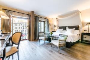 Postel nebo postele na pokoji v ubytování Grand Hotel Don Gregorio