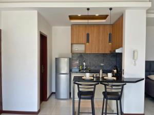 Kuchyň nebo kuchyňský kout v ubytování MONOAMBIENTES RESIDENCIALES en TARIJA