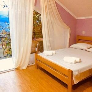 En eller flere senge i et værelse på cottage in tsemi (Borjomi)