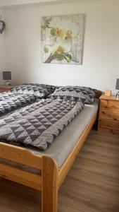 Postel nebo postele na pokoji v ubytování Elas Ferienhaus 62