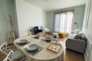 Χώρος καθιστικού στο Apart'Champagne Les Deux Ponts station & center