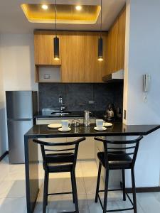 Kuchyň nebo kuchyňský kout v ubytování MONOAMBIENTES RESIDENCIALES en TARIJA