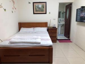 Postel nebo postele na pokoji v ubytování Nantang No. 1