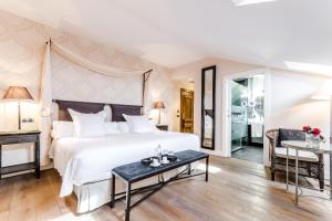 Postel nebo postele na pokoji v ubytování Grand Hotel Don Gregorio