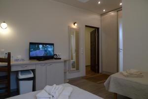 TV a/nebo společenská místnost v ubytování Feyena Guesthouse + 11 fotografií