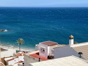 a view of the ocean from a building at Coastine Granada - Casa con vistas al mar en Castell de Ferro in Castell de Ferro