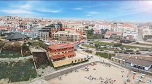 an aerial view of a city with a red circle at Heart Stone by the Sea in Lourinhã