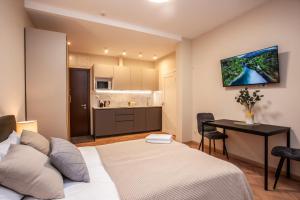 Et tv og/eller underholdning på Upisa Studio Apartments