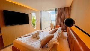 TV a/nebo společenská místnost v ubytování Setai Edition By Setai Apartaments