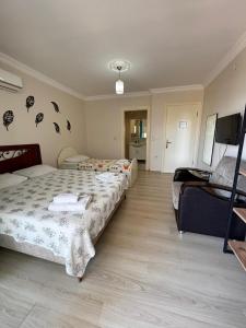 Ένα ή περισσότερα κρεβάτια σε δωμάτιο στο Otuz5 Otel