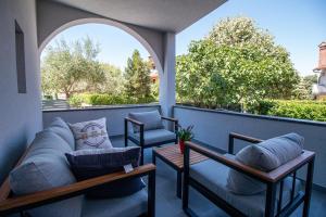 Khu vực ghế ngồi tại Apartments Mila