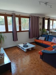 Posezení v ubytování Appartement, jardin, piscine, à 15 minutes mer et Espagne