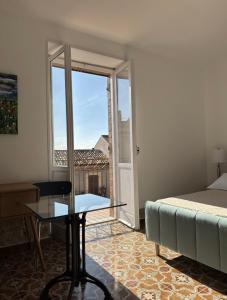 Postel nebo postele na pokoji v ubytování SAGARESE Sleep & Dreams