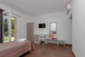 Et tv og/eller underholdning på Resort La Ficaccia