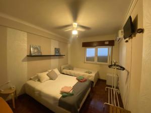 TV a/nebo společenská místnost v ubytování Guest House Patrocinio