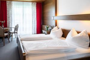 Postel nebo postele na pokoji v ubytování Attergau Rooms - Self Check-In