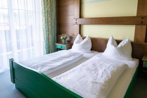 Postel nebo postele na pokoji v ubytování Attergau Rooms - Self Check-In