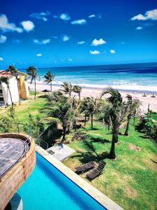 a view of the beach from the balcony of a resort at CosteiraPRAIASOLPontaNegra, Natal-RN in Natal