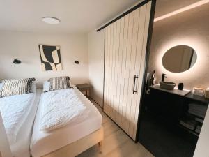 Letto o letti in una camera di Garður Apartments