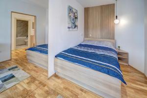 a bedroom with two beds in a room at Spa King Apartments 3 in Belgrade