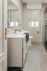 Koupelna v ubytování Apto Barrio Húmedo Conde Luna y parking incluido + 15 fotografií