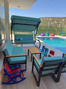 Gambar di galeri bagi مزرعة وشاليه ومنتجع أمينه Amina Chalet di Amman