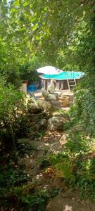 Zahrada ubytování maison au calme avec piscine