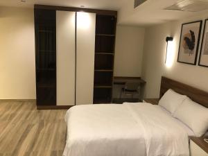 Katil atau katil-katil dalam bilik di House 98 - Boutique Hotel Stay in Zayed