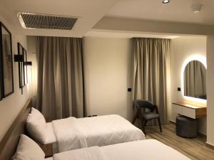 Katil atau katil-katil dalam bilik di House 98 - Boutique Hotel Stay in Zayed