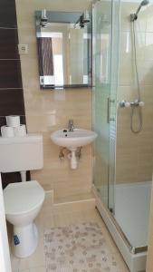 Kúpeľňa v ubytovaní Lara Apartments