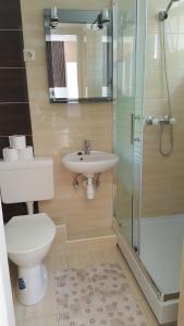 Kúpeľňa v ubytovaní Lara Apartments