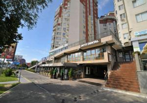 a building on the side of a city street at ERA RENT Apartments in Chişinău