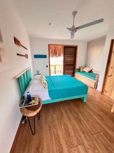 Postel nebo postele na pokoji v ubytování Habitación KITE en Mojarra Beach