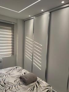 a bedroom with a bed with a pillow on it at Mel Apt in Golem