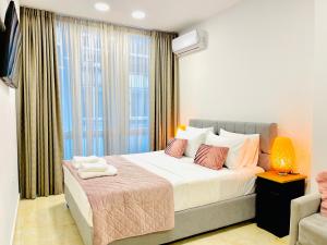 Ένα ή περισσότερα κρεβάτια σε δωμάτιο στο Narek luxury Apartment's