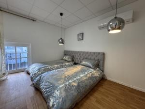 Postel nebo postele na pokoji v ubytování Le Saint Denis 4 - Deluxe - 4pers - Rêve au Mans