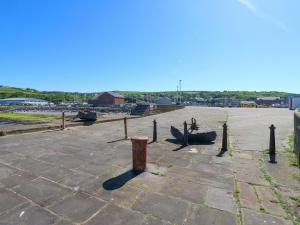 a large parking lot with a person sitting in the middle at Lowther Penthouse in Whitehaven